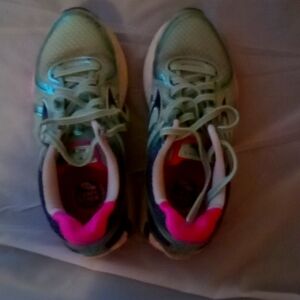 Brooks running for women or girls. Very popular a little silver, gold, and pink.
